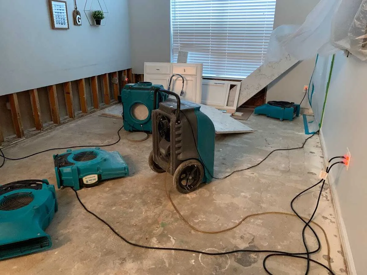 Dehumidifier in flood-cut room for Water Damage Restoration in Pacifica
